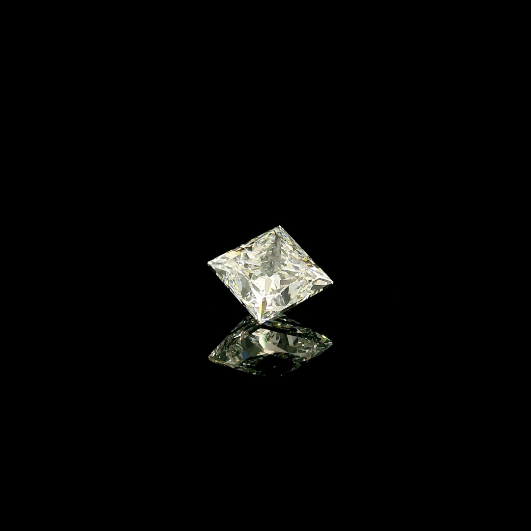 A 1.5 ct. Princess Cut Lab Grown Diamond reflecting on a black surface.