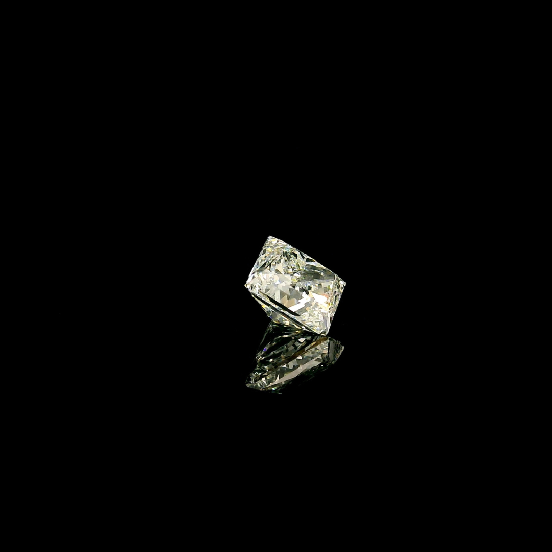 A 1.5 ct. Princess Cut Lab Grown Diamond reflects light against a black background.