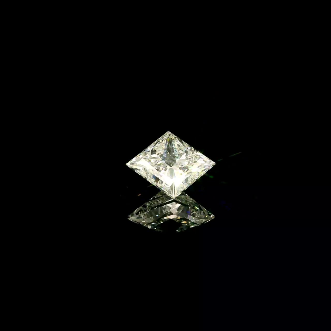 A 2 ct. Princess Cut Lab Grown Diamond centered against a black background with a visible reflection beneath it.