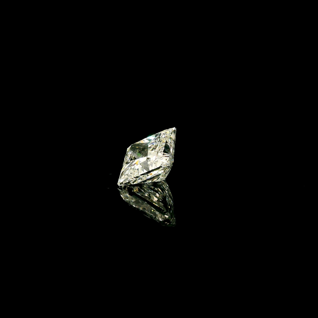 A 2 ct. Princess Cut Lab Grown Diamond reflecting on a black surface.