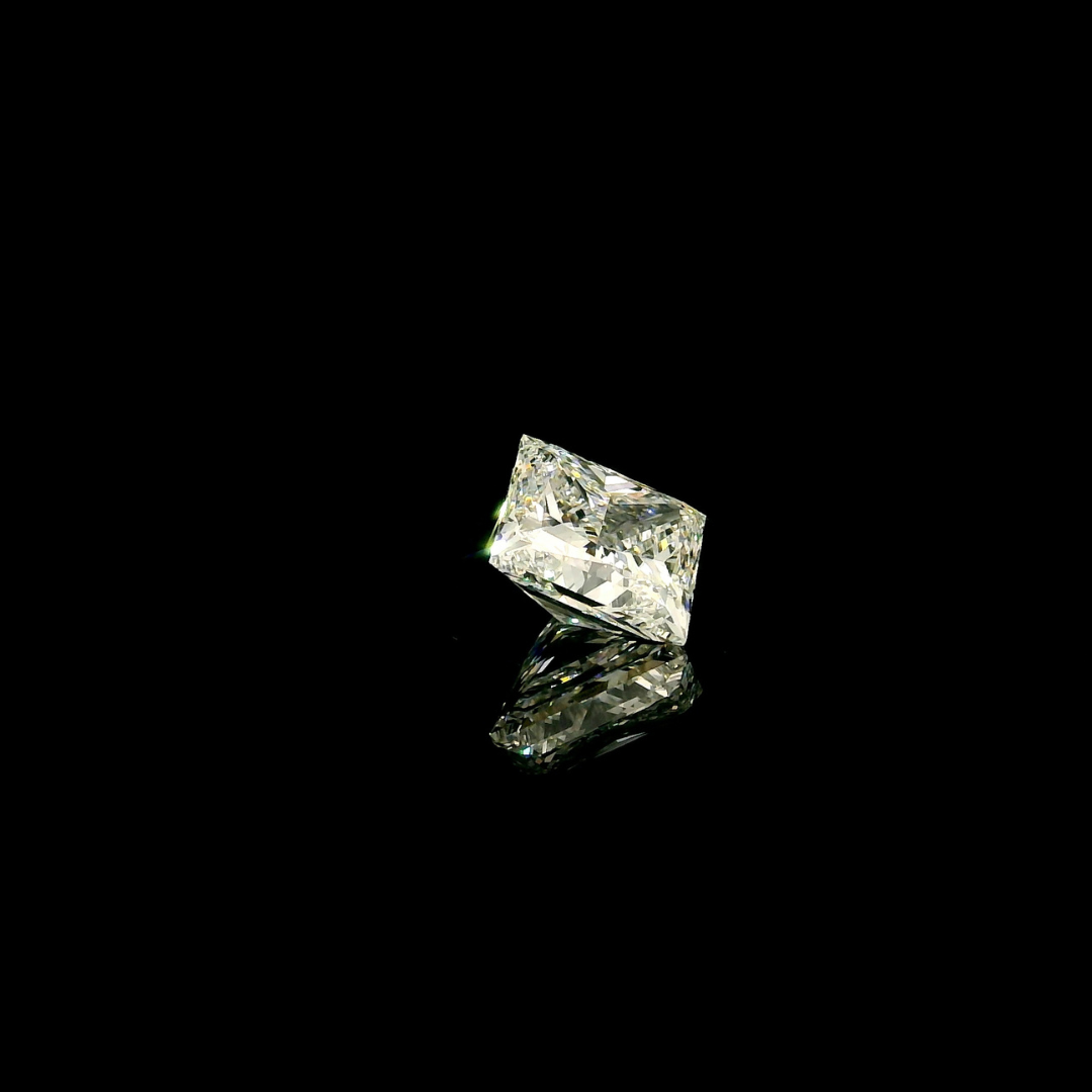 2 ct. Princess Cut Lab Grown Diamond against a black background with a visible reflection.
