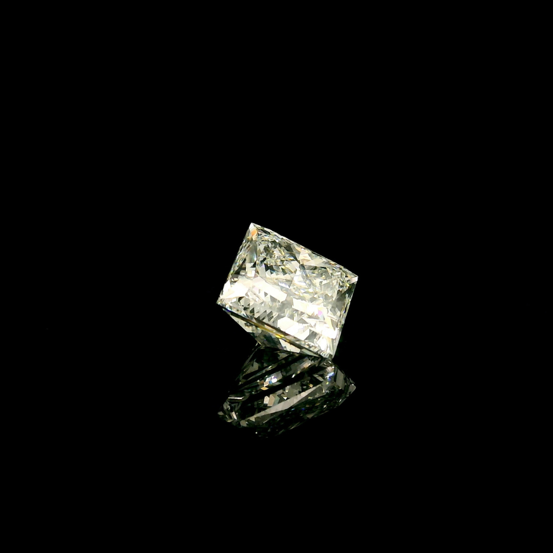 A 3 ct. Princess Cut Lab Grown Diamond reflecting on a black surface.