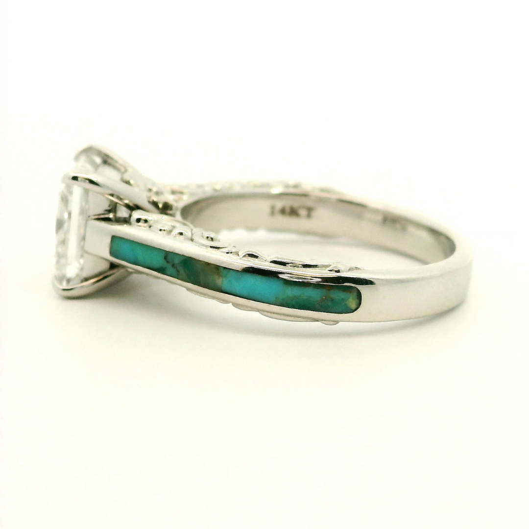 Side view of the Diamond Emory ring—a silver band with a turquoise inlay and a large, clear lab-grown diamond gemstone, marked 14KT inside the band—shown on a white background.