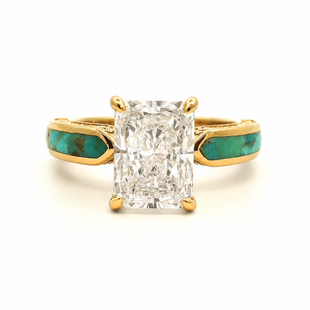 Diamond Rochelle: A lab-grown radiant-cut diamond ring set in yellow gold, featuring the Diamond Rochelle design with turquoise inlays flanking the center stone, displayed against a white background.