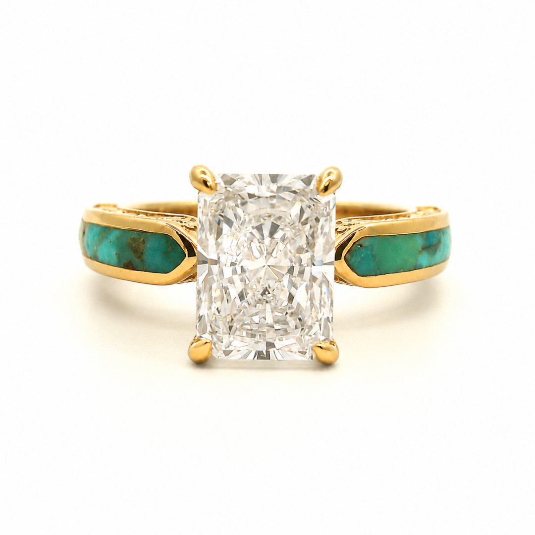 Diamond Rochelle: A lab-grown radiant-cut diamond ring set in yellow gold, featuring the Diamond Rochelle design with turquoise inlays flanking the center stone, displayed against a white background.