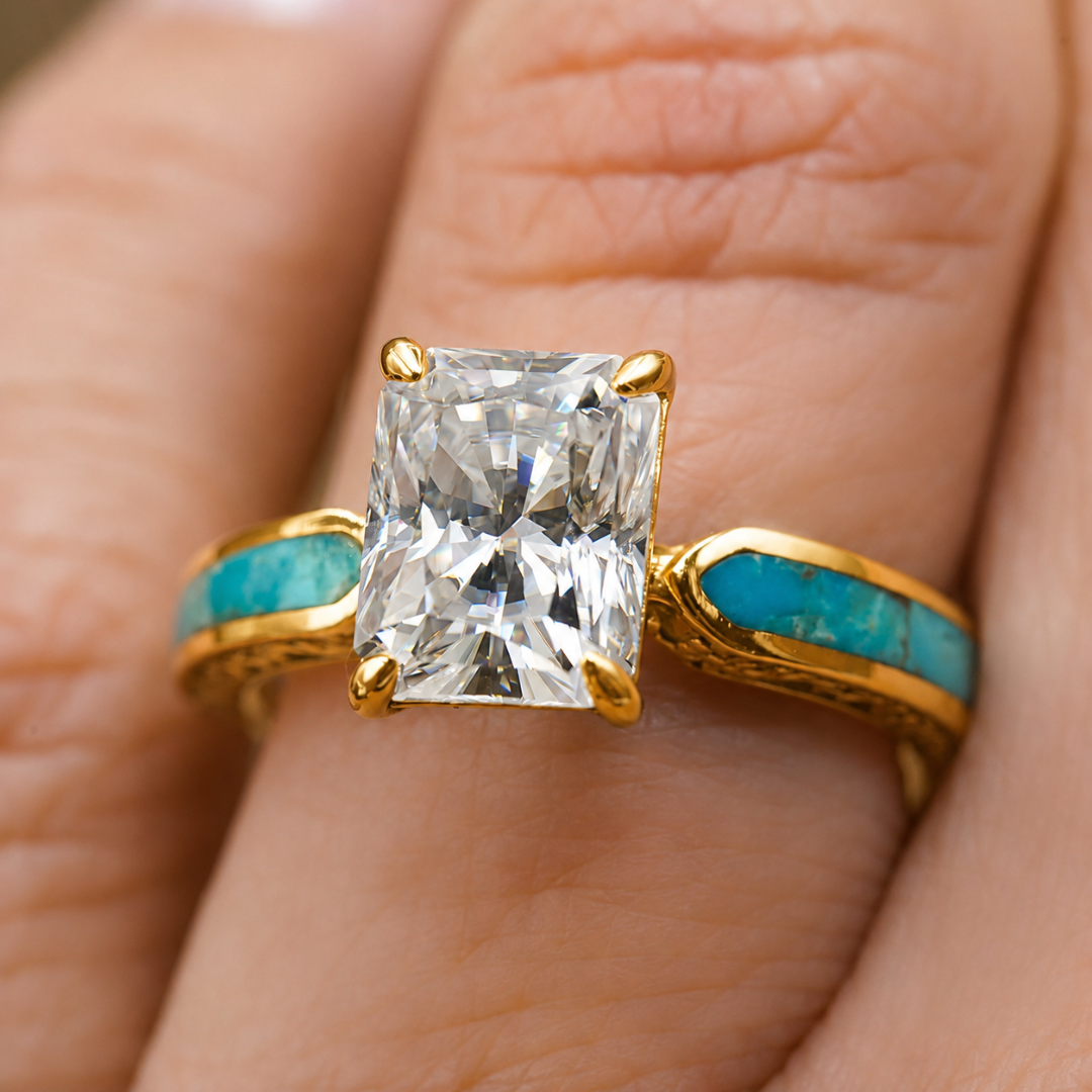 Introducing Diamond Rochelle—a stunning Western engagement ring, featuring a gold band adorned with vibrant turquoise inlays and crowned with a large rectangular lab-grown diamond, elegantly worn on a person's finger.
