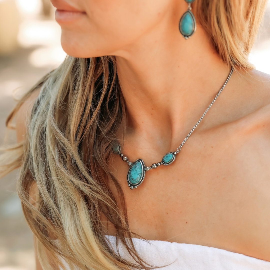 The Kay silver Western turquoise necklace and matching teardrop earring set.