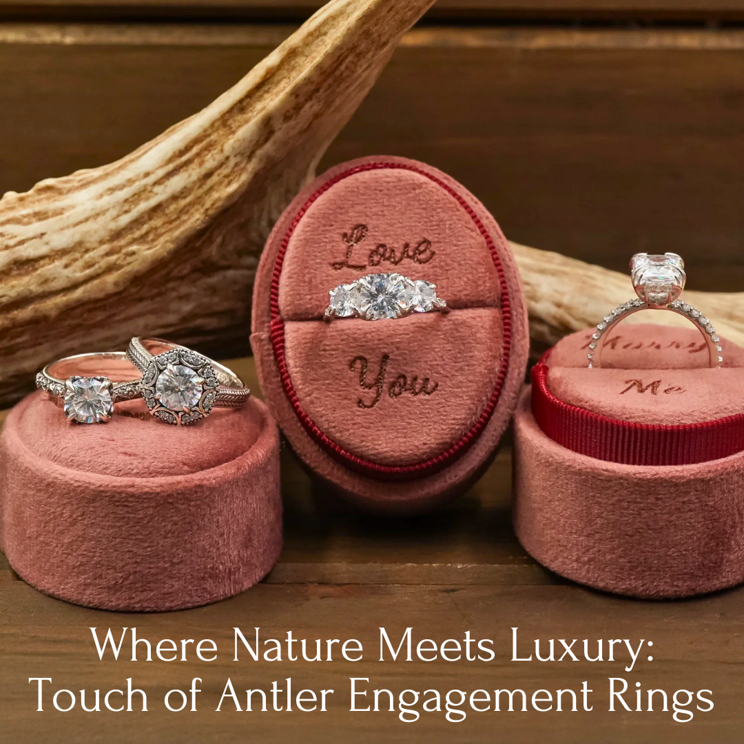 Three diamond engagement rings sit on pink velvet ring boxes in front of a deer antler, with text reading, Where Nature Meets Luxury: Touch of Antler Engagement Rings.