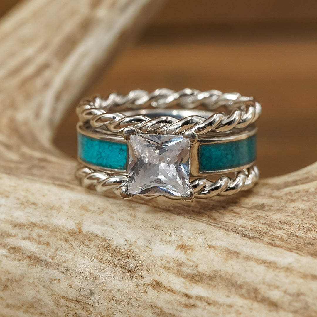 1/8 CT. T.W. Diamond Sideways Cross Wedding Band In Sterling Silver - Foto 1